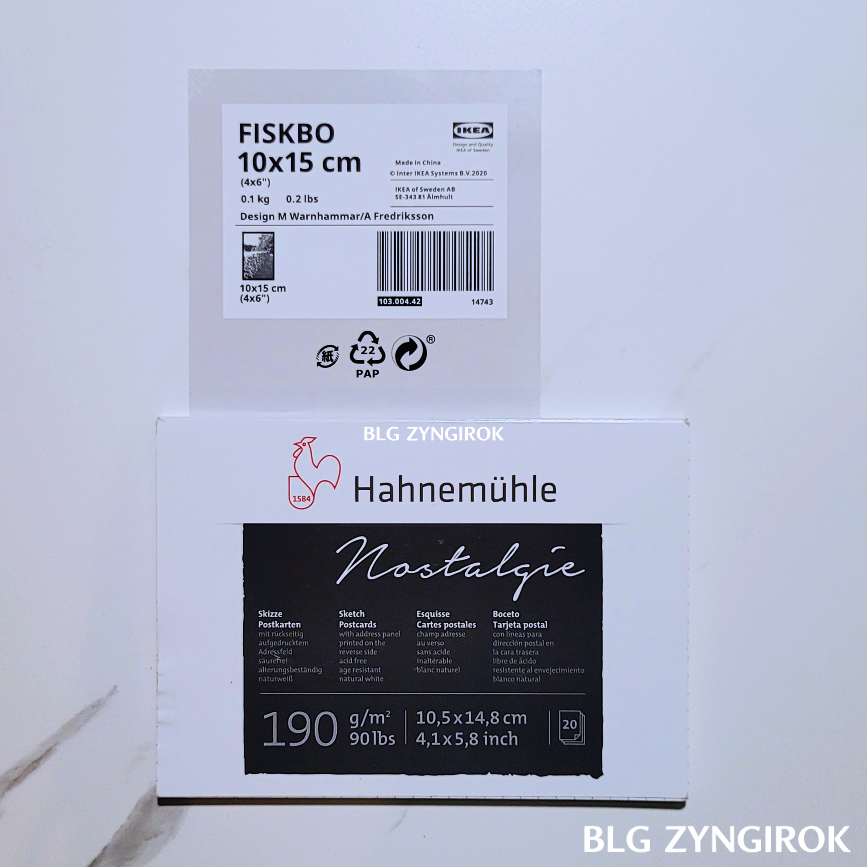 fiskbo-상표-위에-무지엽서가-놓여있다.