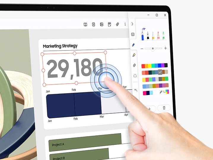노트북 화면을 손가락으로 누르고 있는 사람