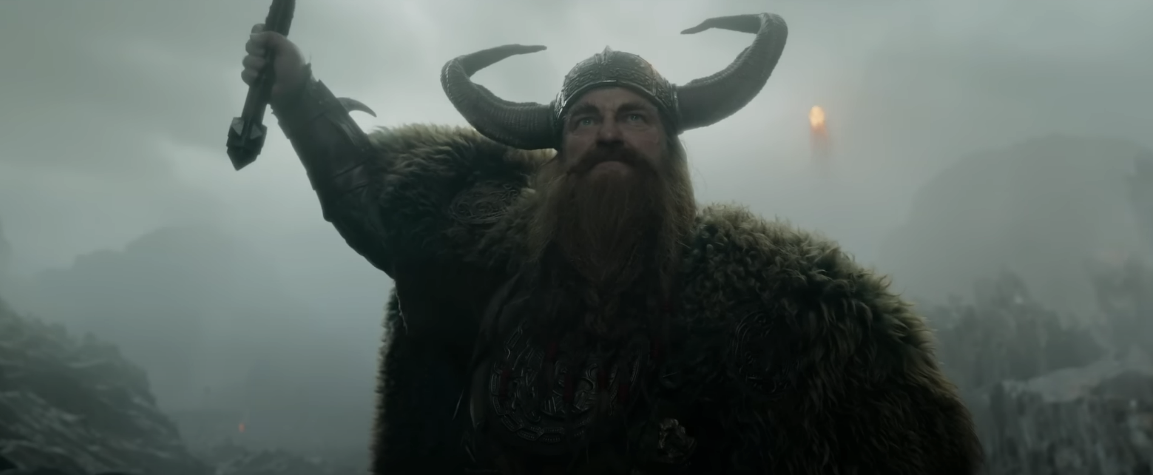 바이킹의 모습을 한 왕이 칼을 높이 들고 있다.