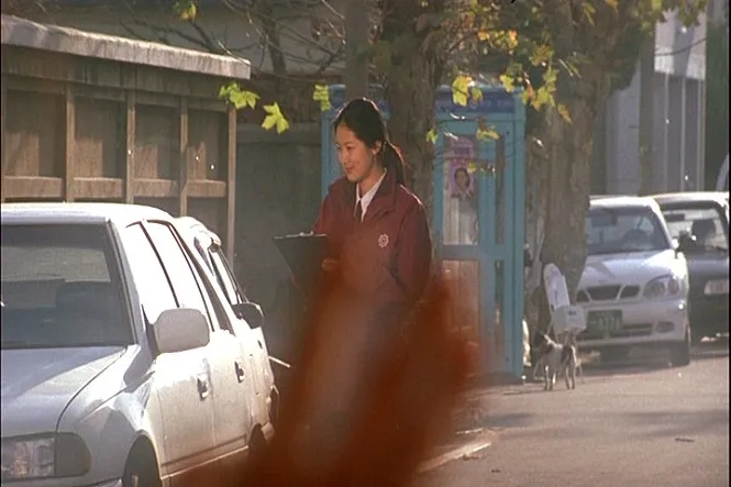 영화-8월의-크리스마스-무단주차-단속중인-다림