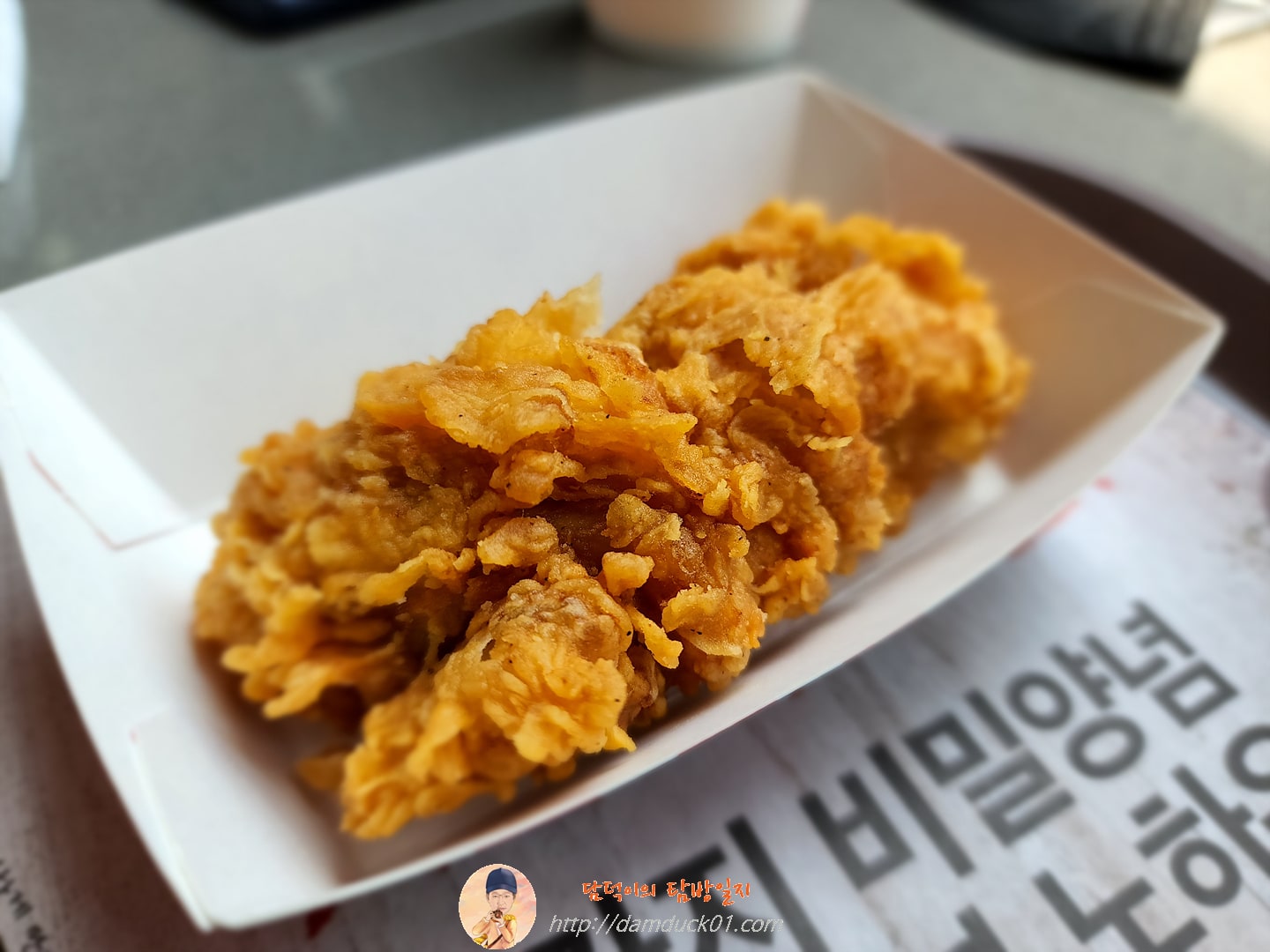 블랙라벨 치킨 한 조각