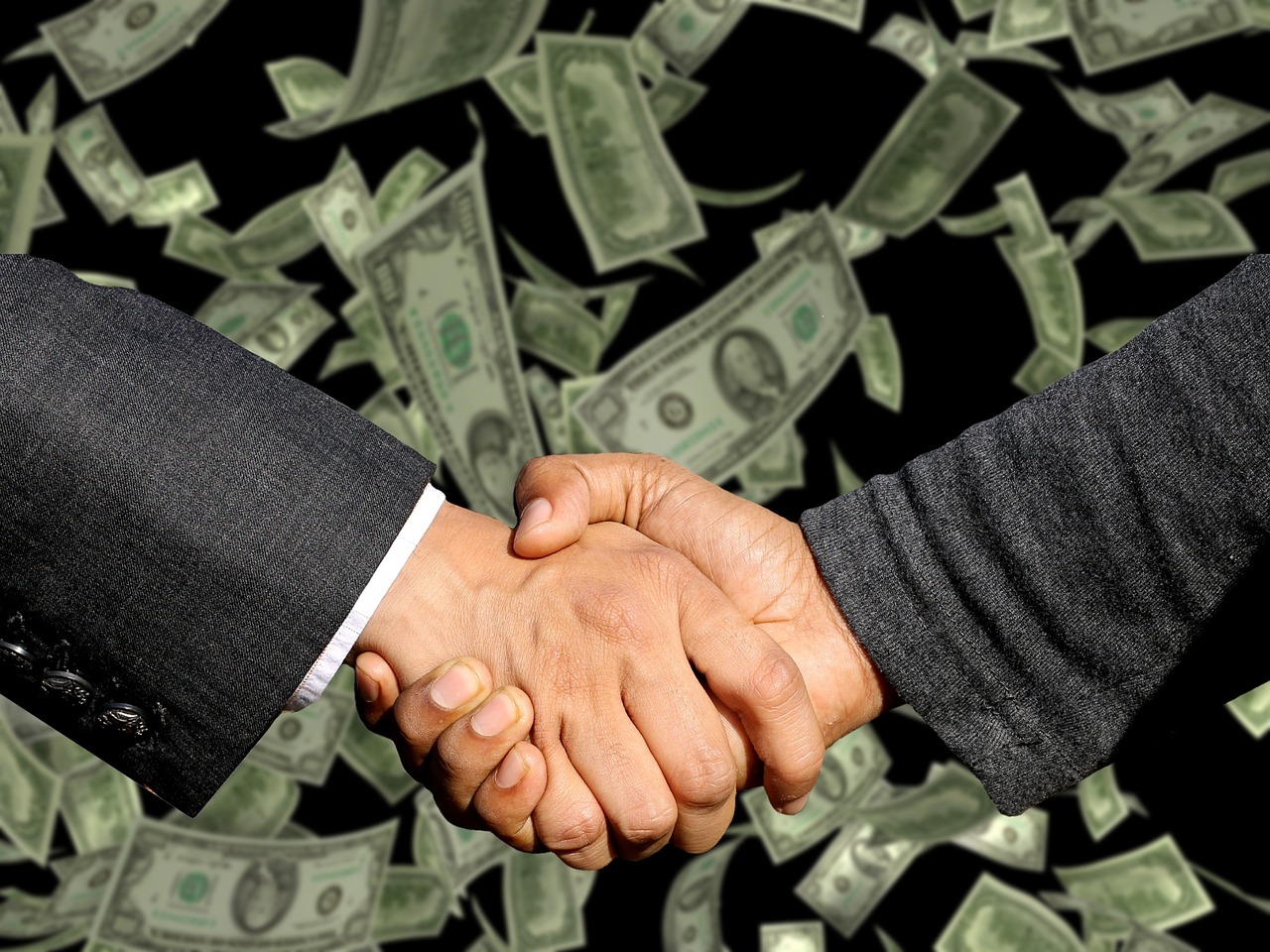 M&amp;A 관련 악수하는 이미지