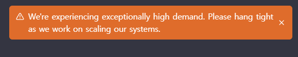 검은색 바탕에 주황색 상자에 &#39;We&#39;re experiencing exceptionally high demand. Please hang tight as we work on scaling our systems.&#39; 라고 적혀있음