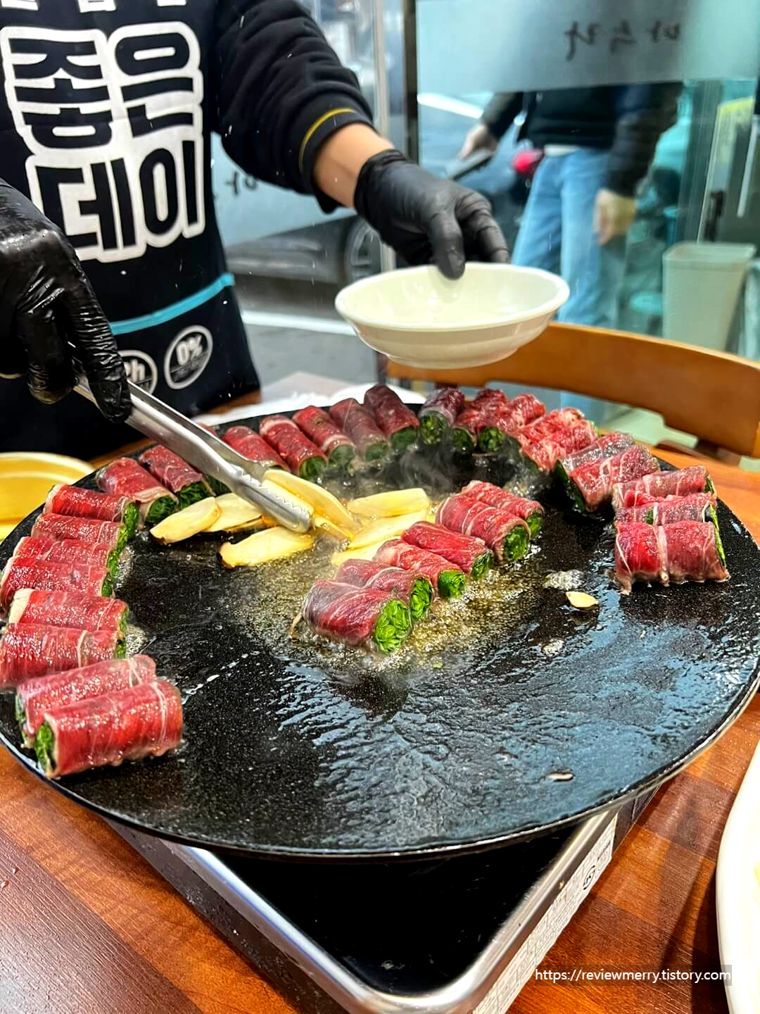 고기말이 구워주는 사진