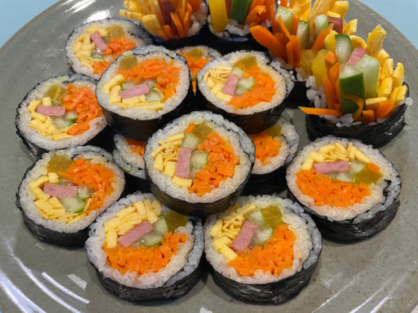 Finished Rumi Kimbap roll with colorful fillings