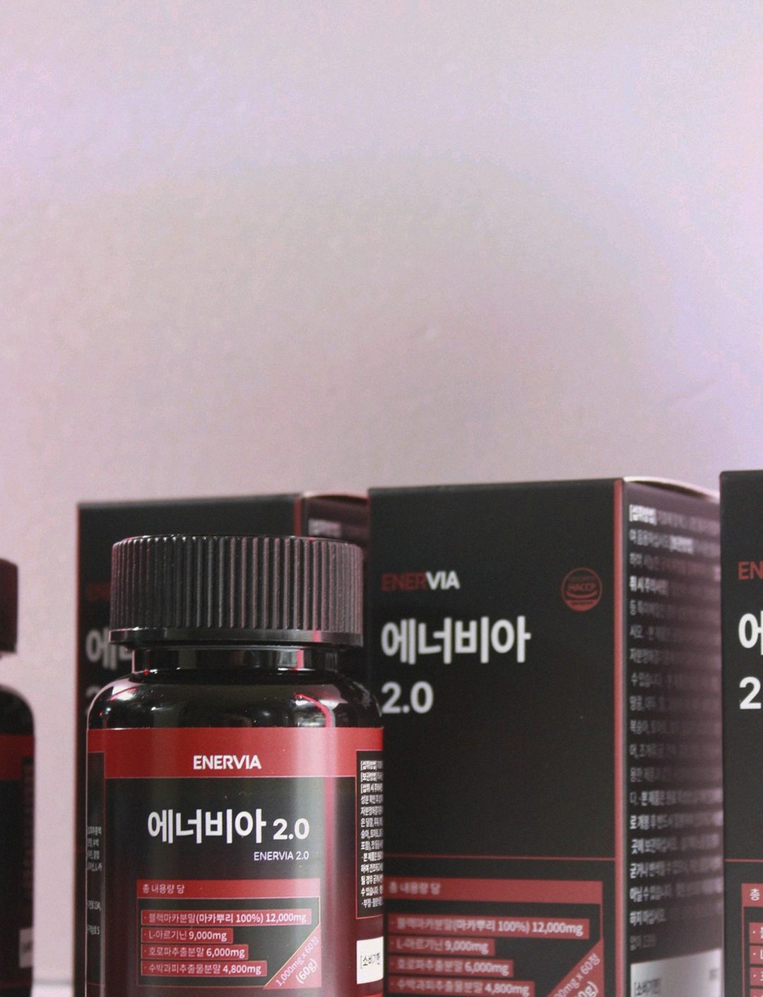 Korean Asian man in his 30s taking supplement before workout at gym