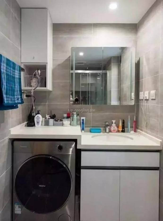 화장실에-놓여있는-세탁기