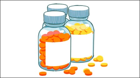비타민 알약과 병