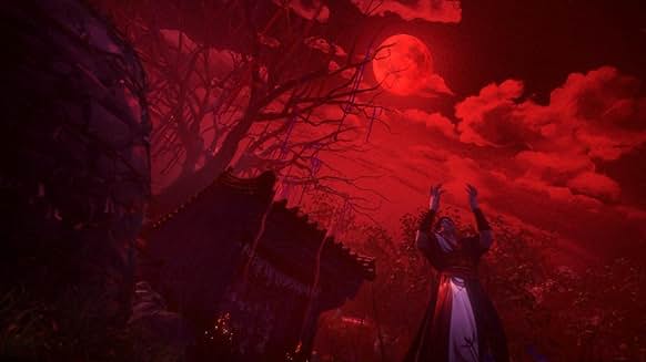 붉은 달과 뒤틀린 나무 아래에서 두 손을 들어올리며 의식을 수행하는 인물
