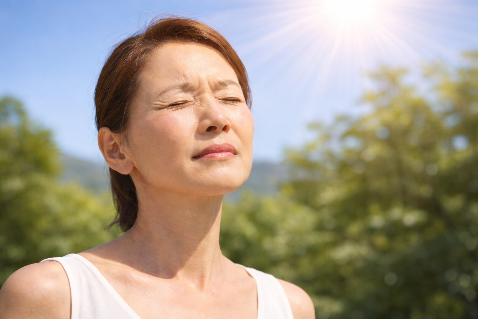 직사광선에 노출된 중년여성의 얼굴