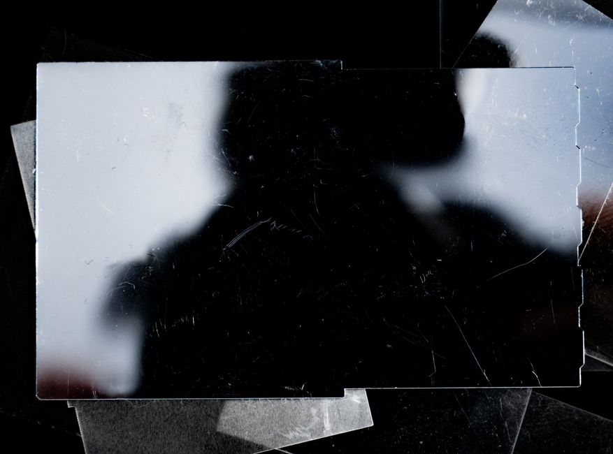 Mysterious silhouette effect created by reflection on a mirror surface.
