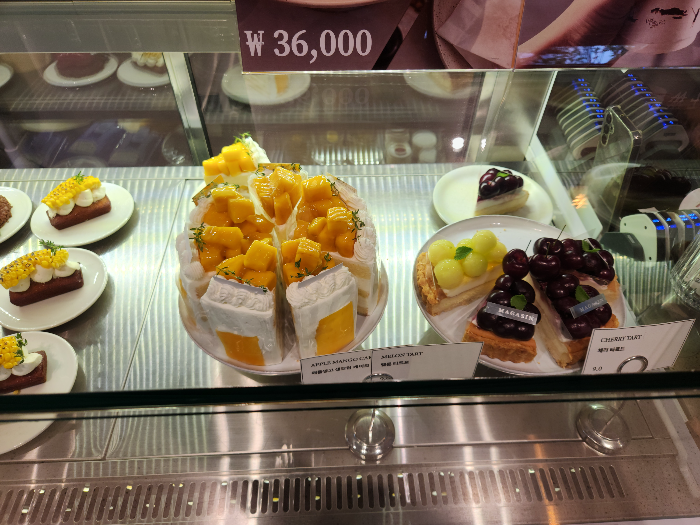 There are many cakes on a plate on the table. 2