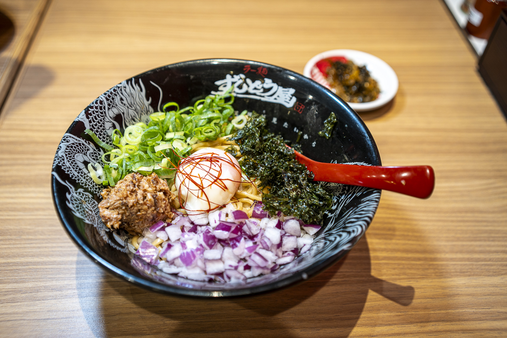 Zundouya — Namba Ebisubashi: A noodle dish with egg, green onions, onions and other toppings.
