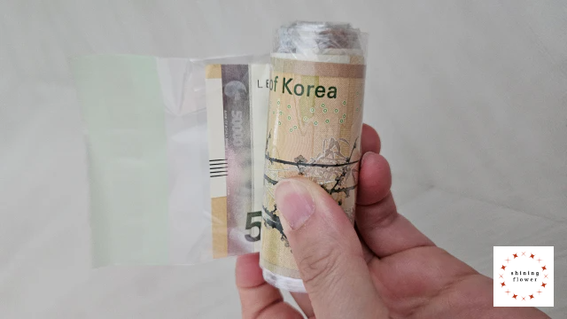 비누꽃 용돈케이크-용돈비닐 돌돌 말기