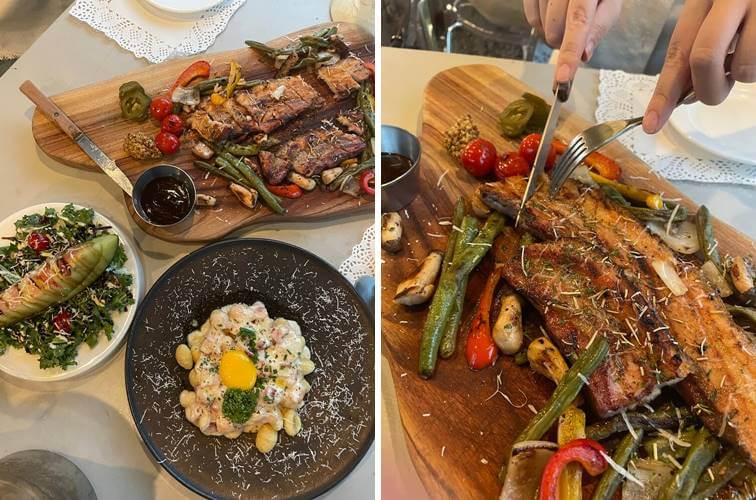 넓은 나무 플레이트 판 위에 올려진 고기와 각종 야채