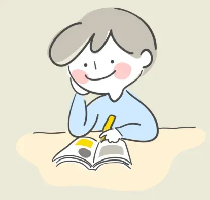 책상에 앉아 공부하는 아이