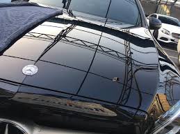 검정차 세차로 관리가 잘된 차량의 사진