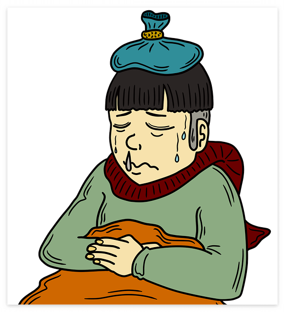 머리에 냉팩을 올리고 콧물을 흘리며 아파하는 모습