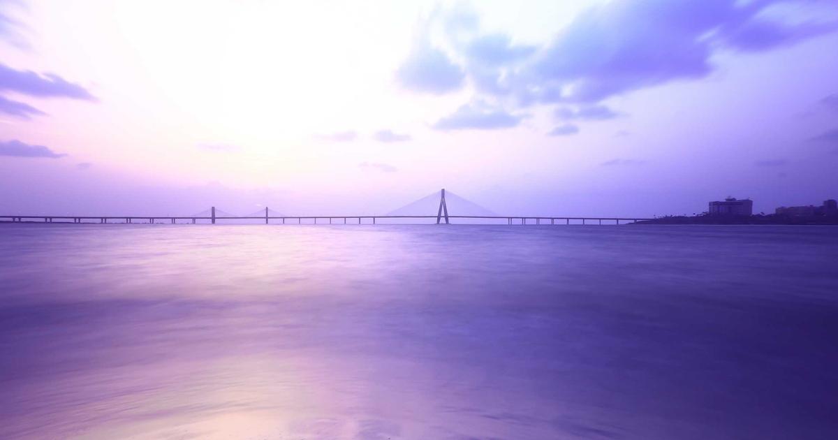 person creating AI images on a tablet with vibrant digital art