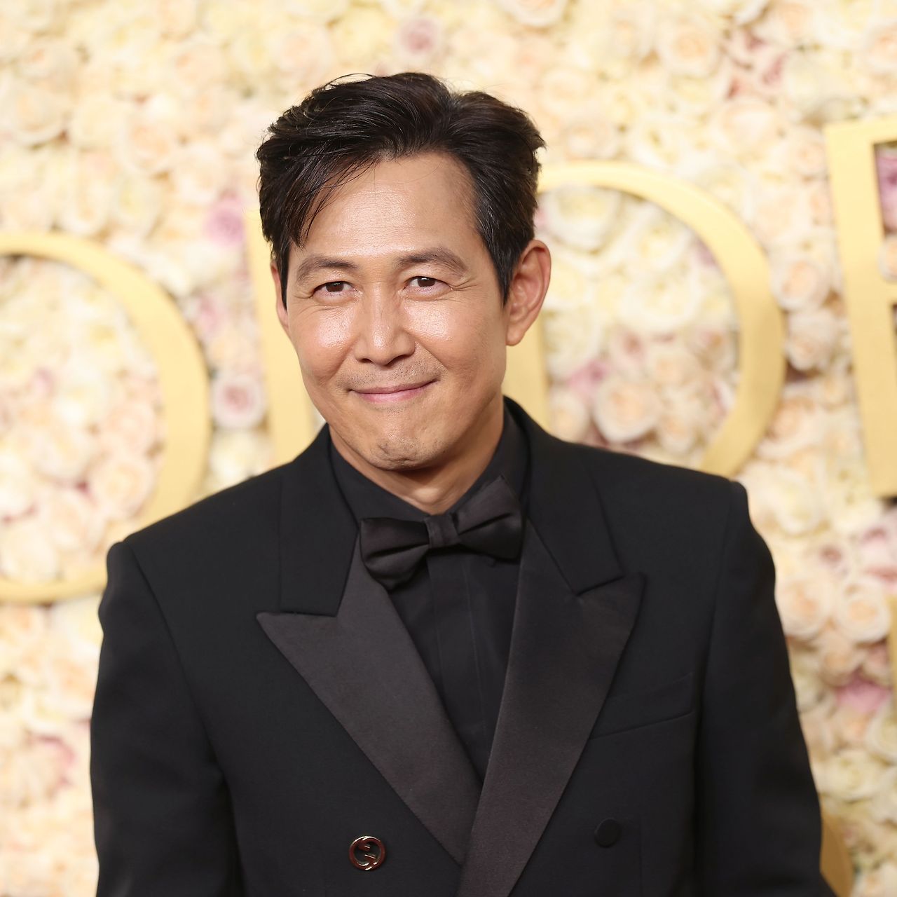 시상식에서 웃고 있는 배우 이정재 사진 이미지