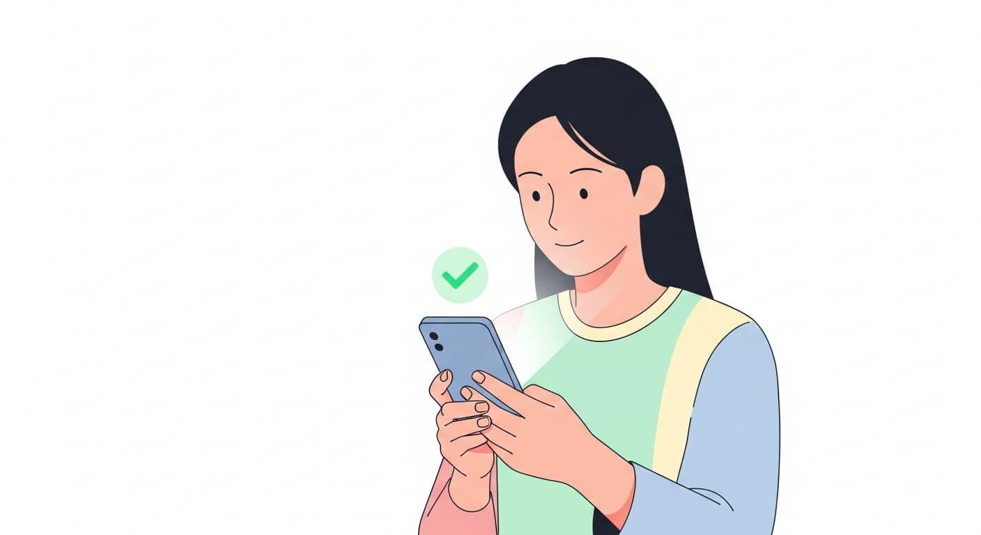 휴대폰 화면에 ‘승인 완료’ 표시가 떠 있는 장면을 확인하는 사람 3