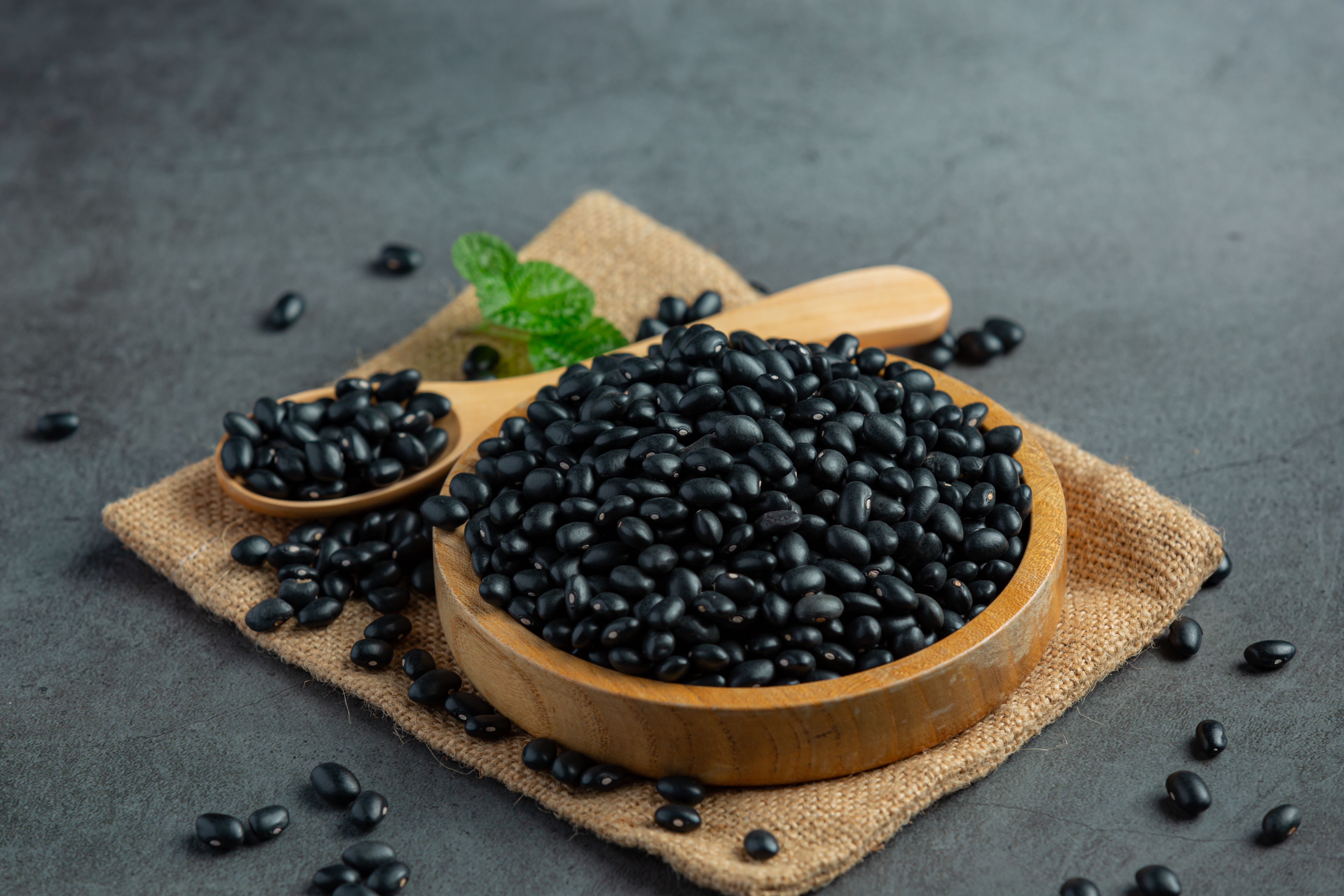 black-bean-small-wooden-plate-place-sack-fabric