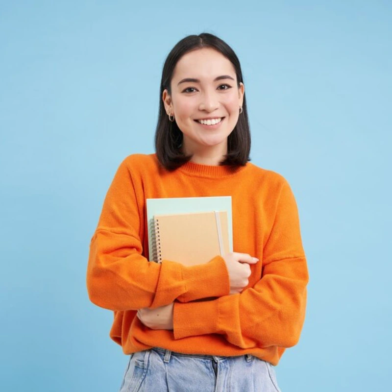 책을 들고 있는 대학생