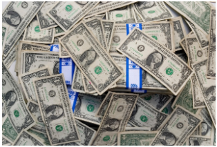 여러 장의 미국 1달러 지폐가 빼곡히 쌓여 있는 모습