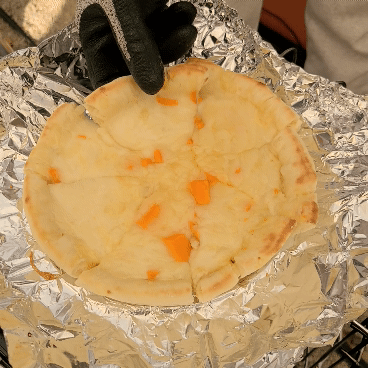 치즈가 쭉 늘어나는 피자