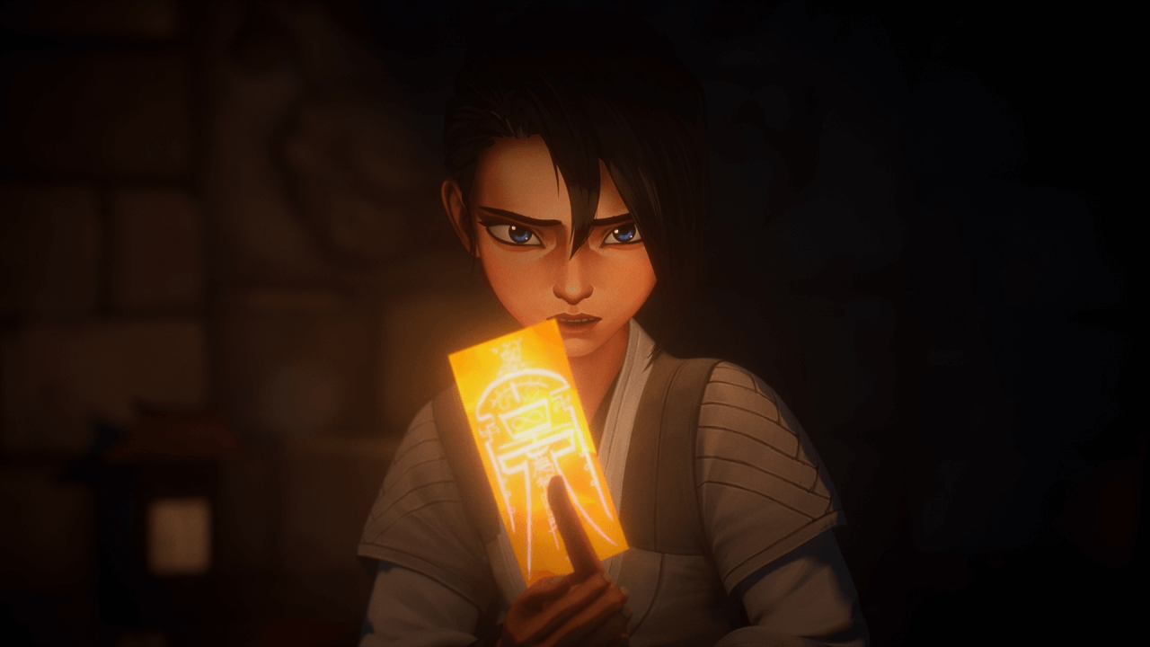 천재적 능력을 가진 소년 준후가 부적을 들고 있는 모습