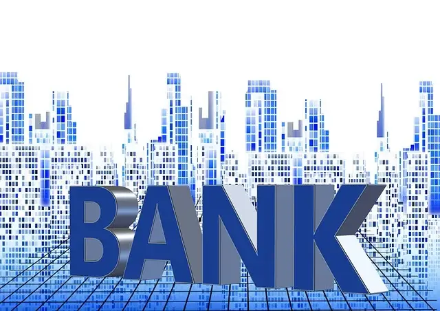 도시 배경의 BANK 입체적 글자