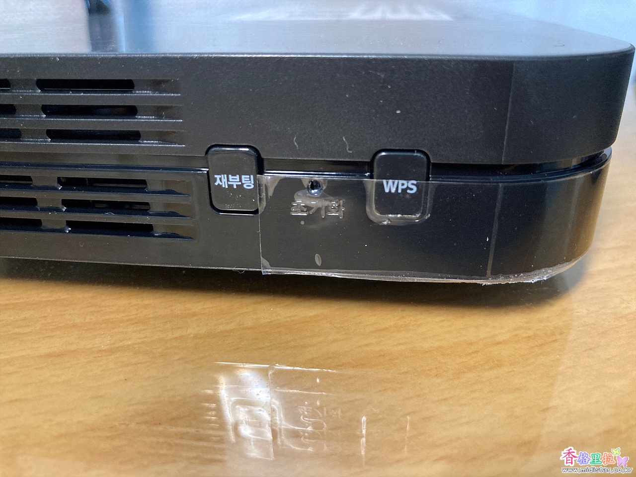 SK Giga WiFi 6 WPS 버튼