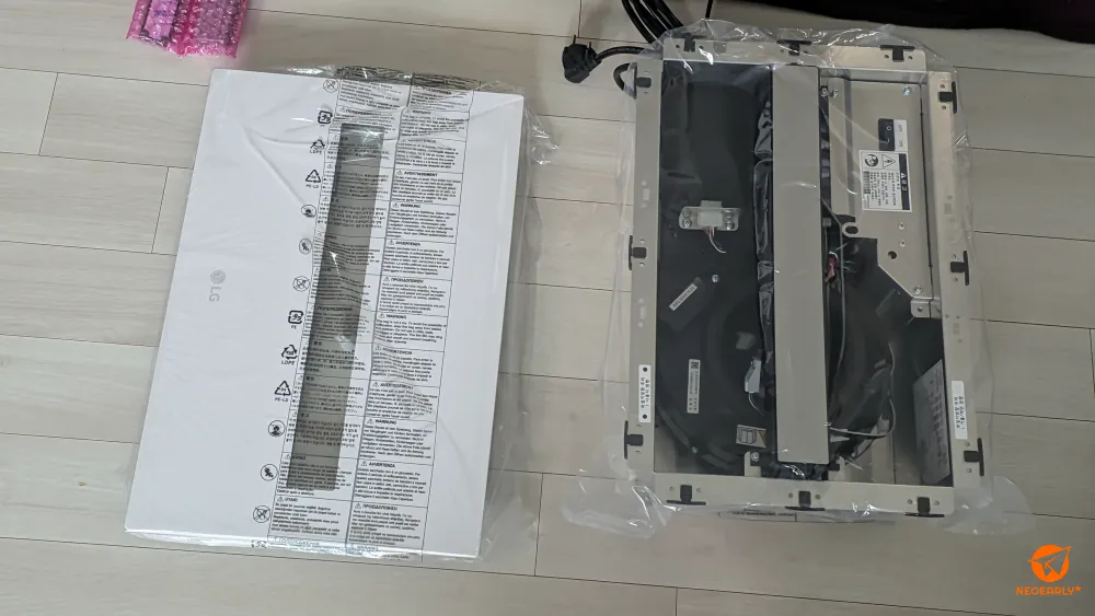 비닐봉투에 담긴 설치전 LG 바스에어시스템 프리미엄 모델입니다.