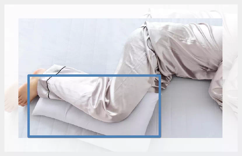 옆으로 누울때 무릎 베개