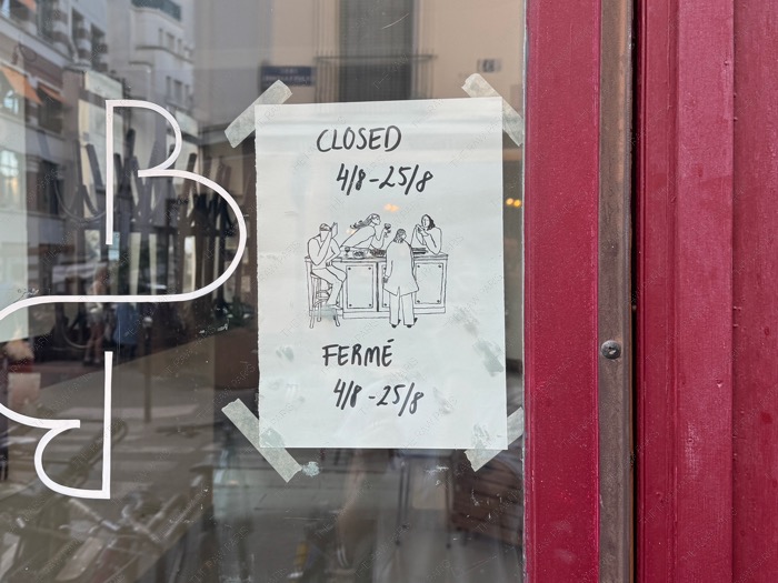 Paris summer closure notice cafe glass window vacances fermeture