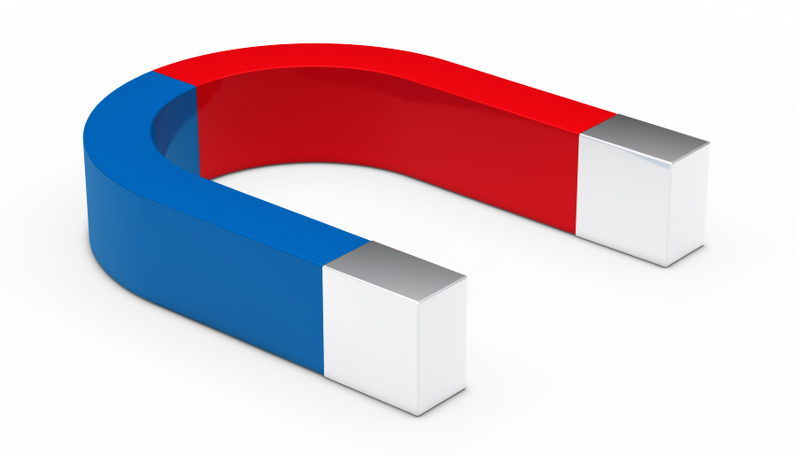 U자 모양으로 N극은 붉게, S극은 파랗게 색칠이 되어 있는 지남철, 즉 자석을 하얀 바닥 위에 놓아두고 찍은 사진