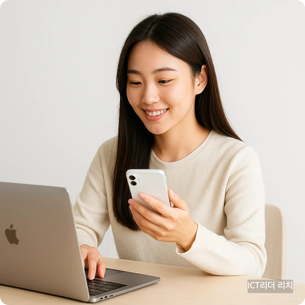 밝고 단정한 20대 여성이 스마트폰과 노트북을 사용하는 모습