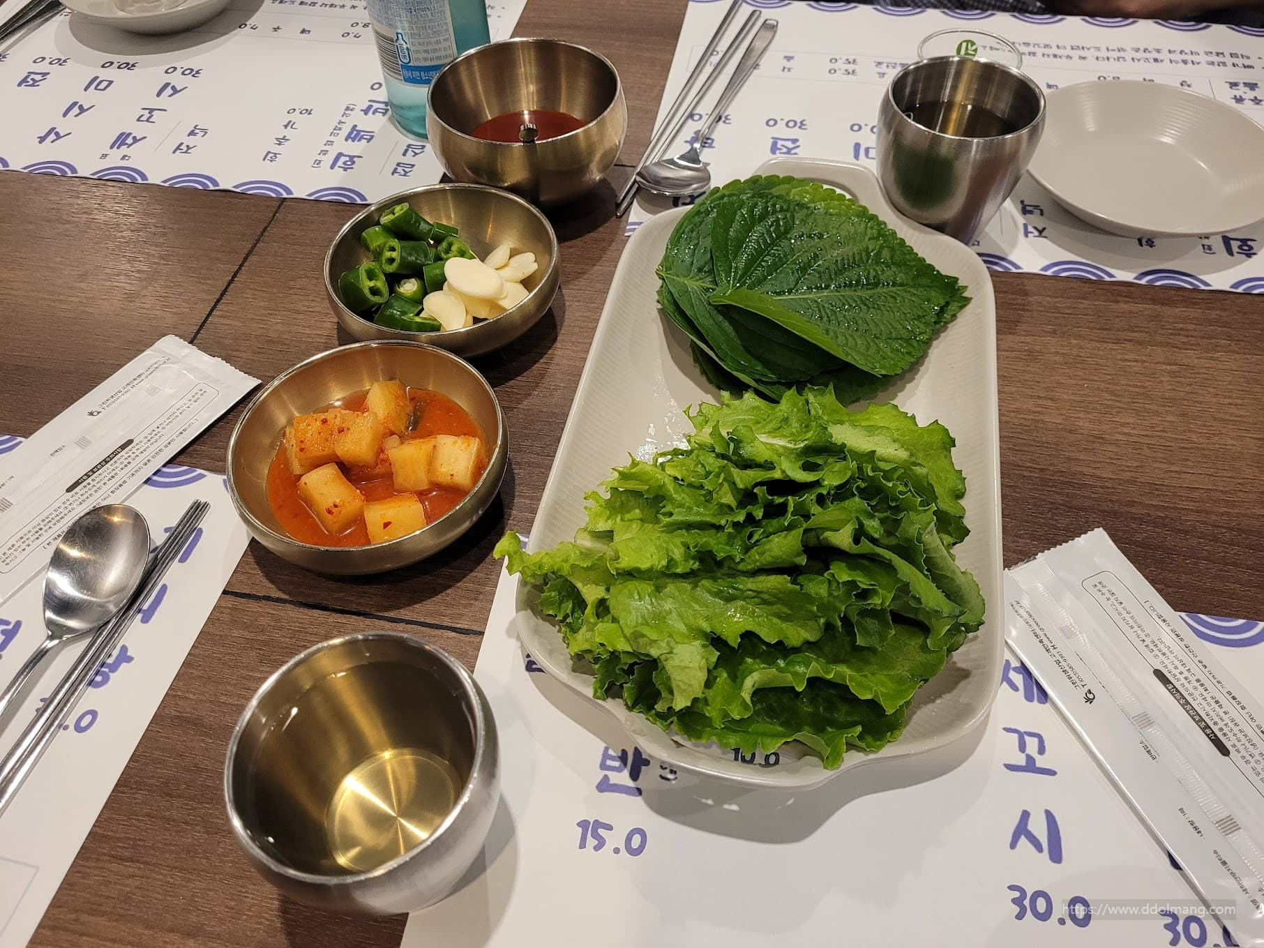 Ssam: A Korean-style wrap made with lettuce or perilla leaves filled with meat and sauces.