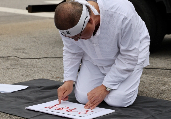 정운천 혈서 작성 이유