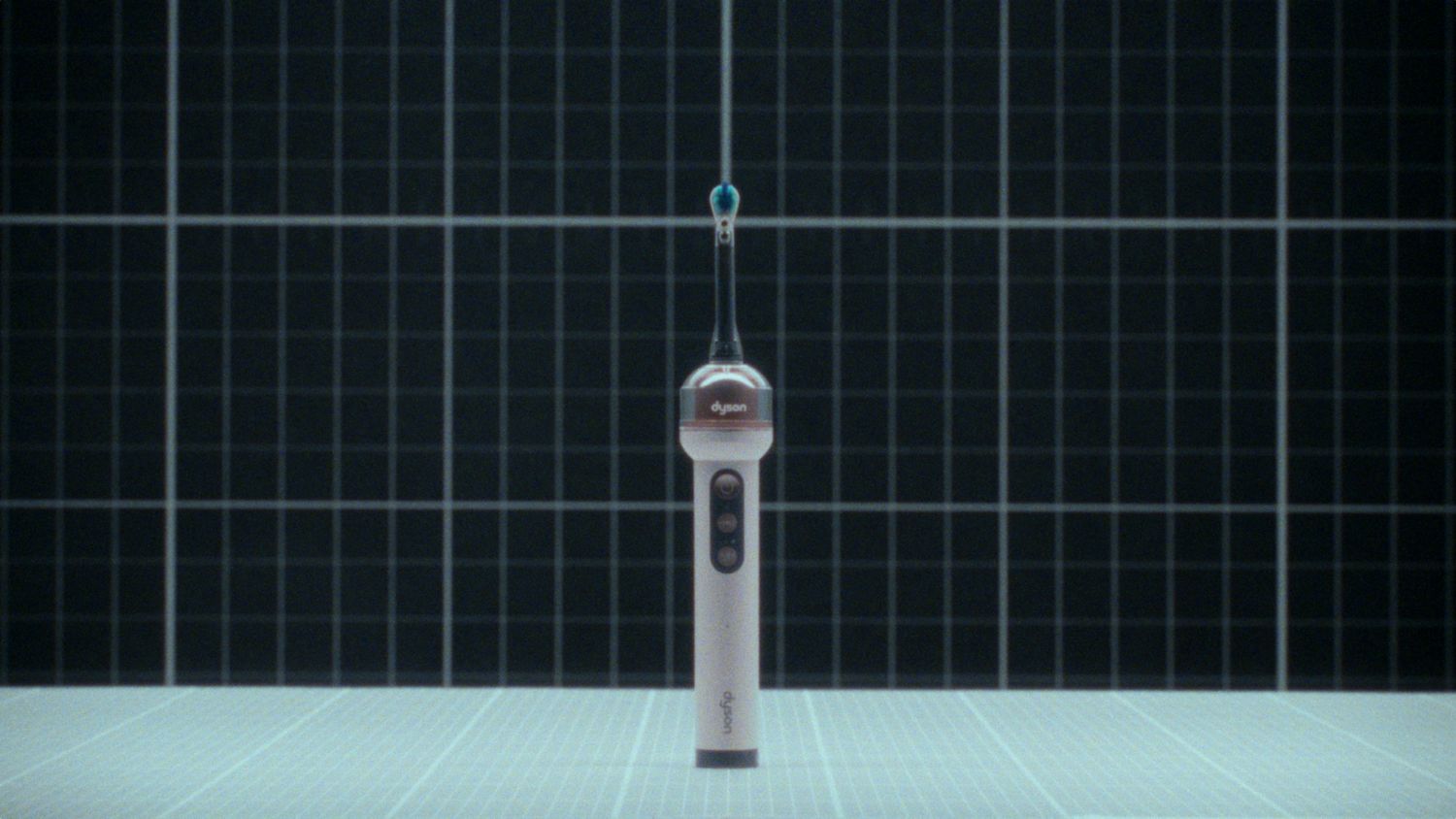 공중에 떠 있는 Dyson CameraJet 전동칫솔 본체