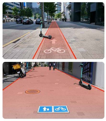 자전거 도로위 붉은색 위 전동킥보드