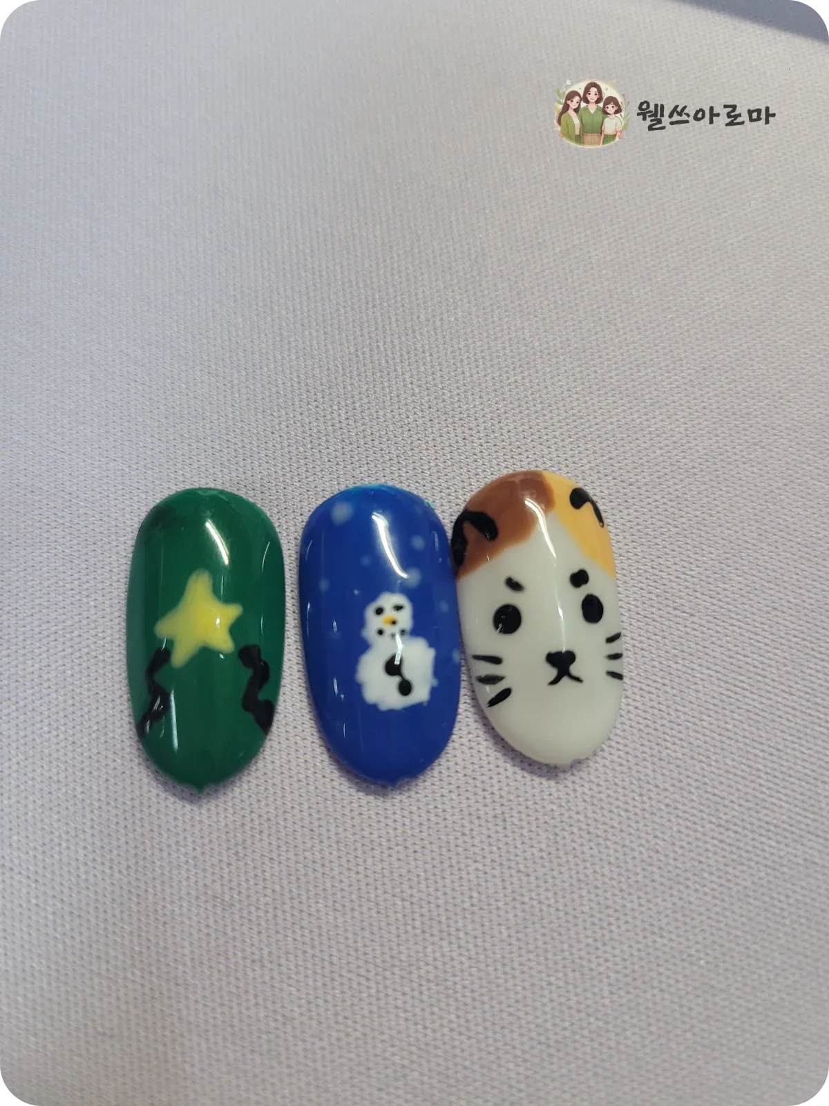 네일팁3가지-초록색바탕노란별-파란색바탕눈사람-흰색바탕노란고양이얼굴