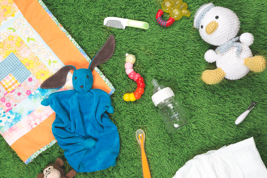 baby toys and milk bottles