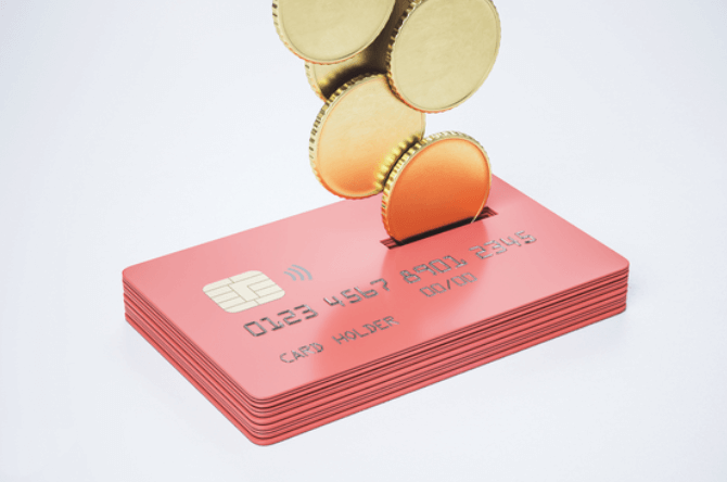 경기도 청년기본소득 경기지역화폐 카드 위로 동전이 쌓이는 모습&amp;#44; 청년 지원금 지급을 상징하는 이미지