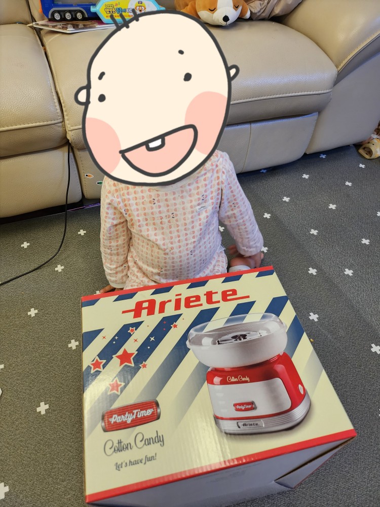 솜사탕 기계와 아이