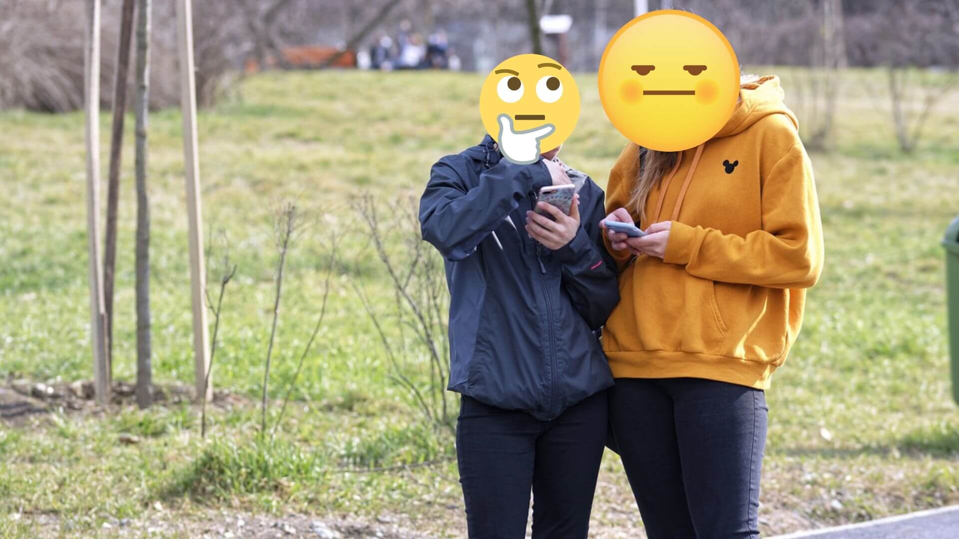 parent giving phone to child