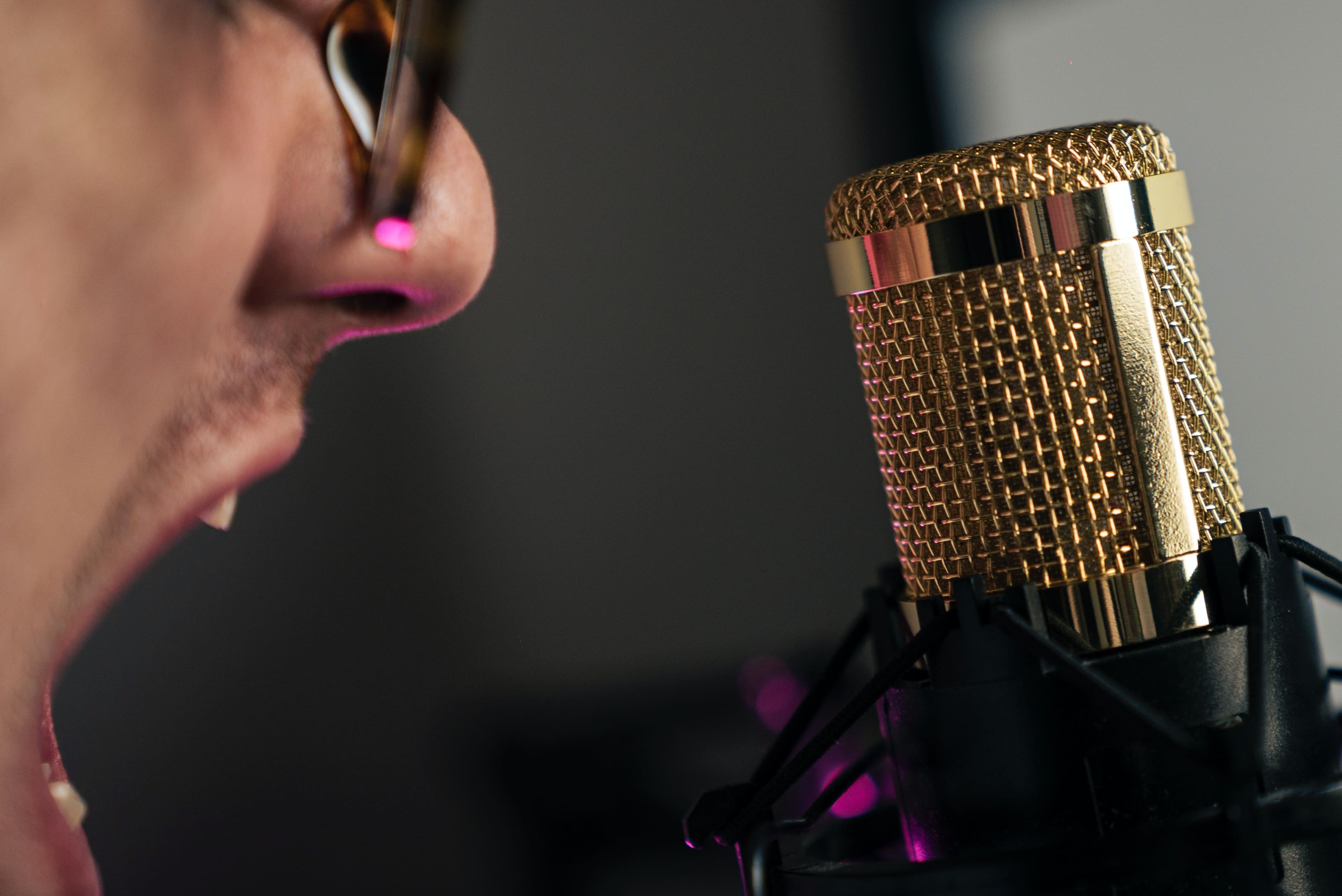 he's talking into the microphone