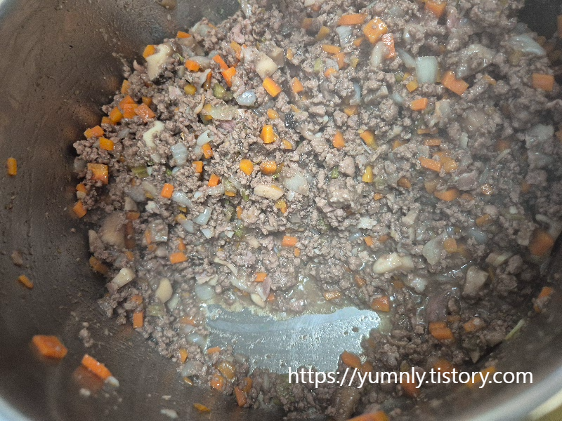 Well-sautéed ground beef and vegetables after the moisture has evaporated