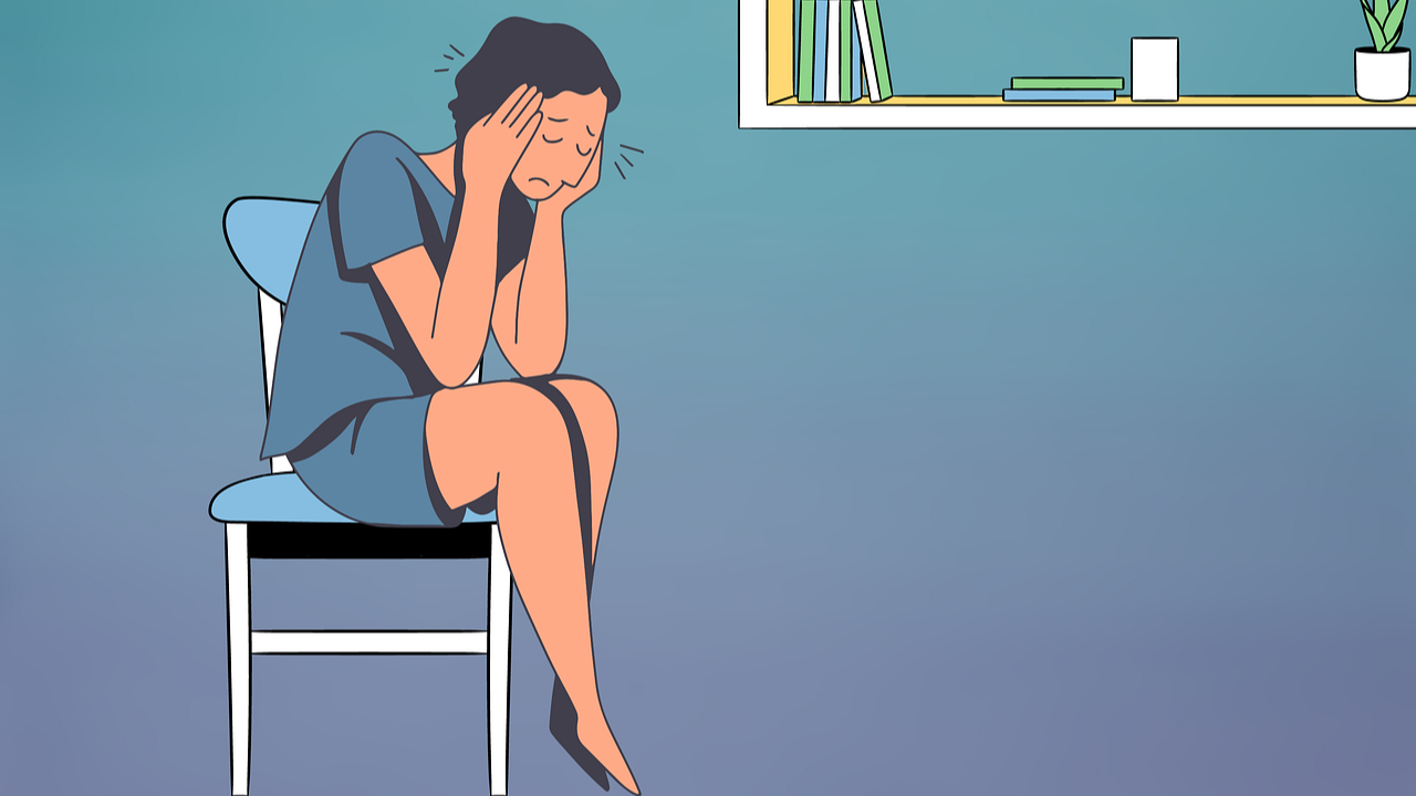 두통을 호소하는 사람의 모습의 일러스트