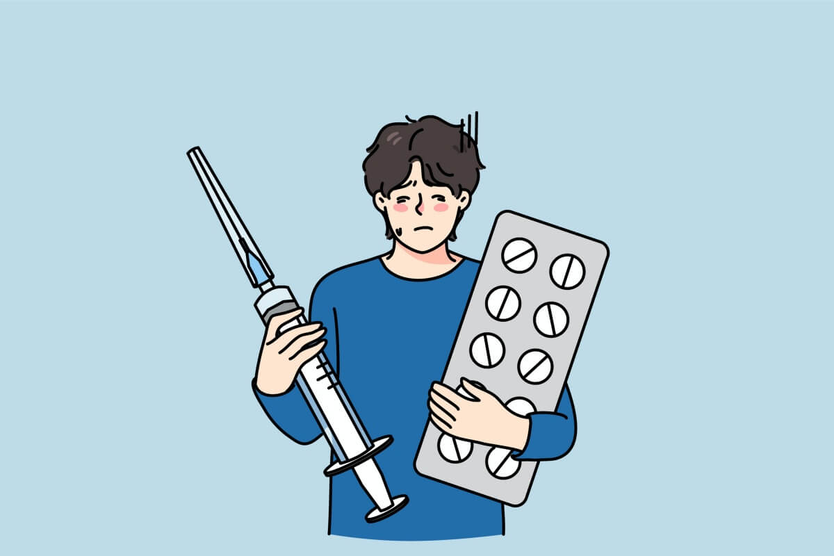 주사와-약을-들고있는-남성
